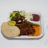 Carne Asada lunch · carne asada with Rice, red beans, salad, cheese, avocado, corn tortillas, meat, chili pepper...