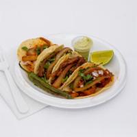 4 Tacos · Tortilla de maiz, cebolla, cilantro, cebolla y chiles asados y la carne de su eleccion. Corn...