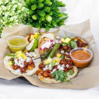 Al Pastor Tacos  · Thinly sliced marinade pork and caramelized pineapple, homemade corn tortillas, fresh white ...