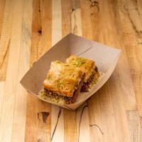 Baklava · Layered filo pastry square with honey and pistachio