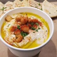 Hummus · Savory chickpea and tahini dip with pita bread