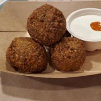 Falafel · Fried chickpea patties with tahini sauce