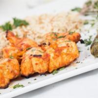 Chicken Breast Filet · Marinated chicken breast, grilled over charcoal.