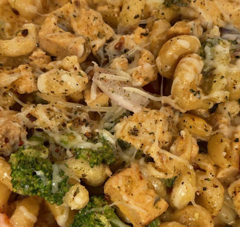 Cajun Chicken Pasta · Pasta tossed with vegetables finished with Cajun cream sauce. 