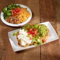 46. Chimichanga · A flour tortilla filled with your choice of chicken or ground beef and deep fried. Smothered...