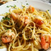 Shrimp Scampi · Sauteed in olive oil, garlic, white wine. Tossed with linguine.