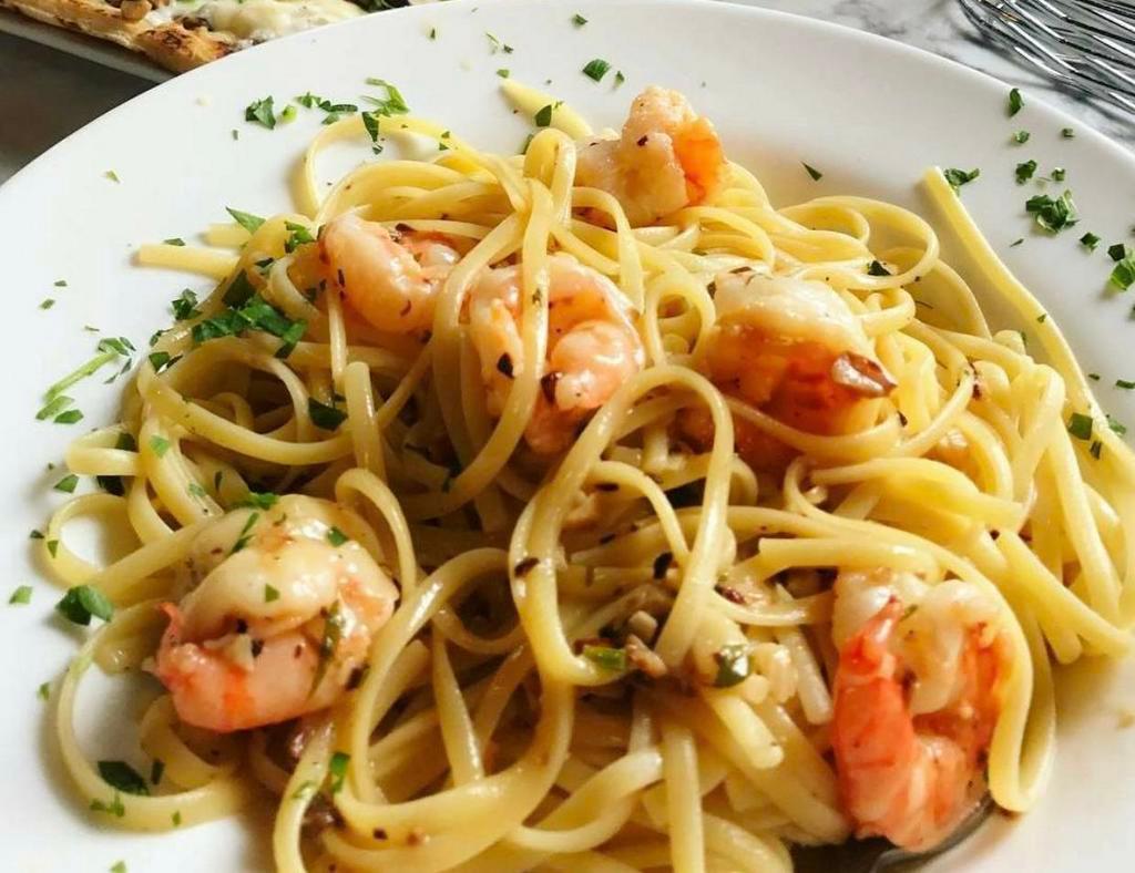 Shrimp Scampi · Sauteed in olive oil, garlic, white wine. Tossed with linguine.