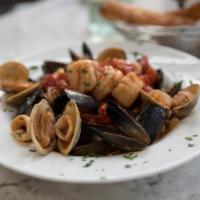 Misto di Pesce · Calamari, shrimp, scallops, littlenecks, and mussels sauteed in olive oil, sweet cherry toma...
