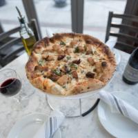 Paul Revere Pizza · Breaded chicken cutlet, garlic, olive oil, pecorino Romano cheese, oregano, and mozzarella c...