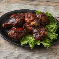 Traditional Wings · Wings tossed in the sauce of your choice and served with choice of dressing. Extra dipping s...