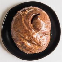 Cinnamon Roll-KNEAD · Our brioche dough rolled with cinnamon and topped with a house made cinnamon glaze.