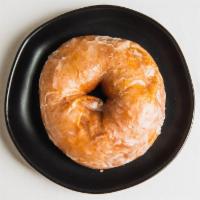VEGAN Vanilla · Our signature vegan dough finished with a simple glaze made in house with fresh vanilla beans.