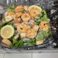 Shrimp Caesar Salad · Pita, Caesar dressing, grated cheese, croutons, romaine and grilled shrimp.