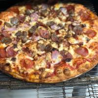 Meat Lovers Pizza · Pizza sauce, cheese, pepperoni, salami, sausage, ham, hamburger, chicken and bacon.