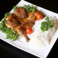 29. Chicken Tabaka Dinner · Cornish game hen, flattened and fried. Served with rice, hummus, salad and pita bread.
