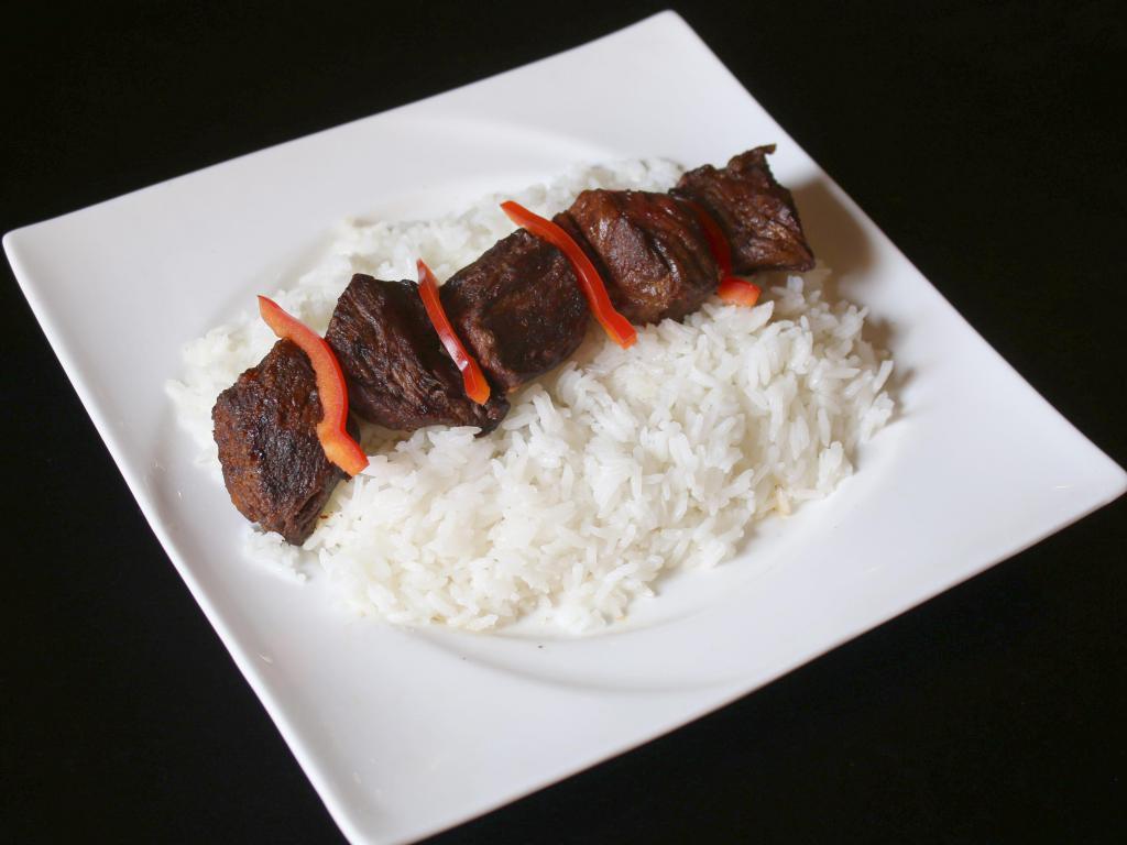 32. Beef Shish Kabab Dinner · Beef chunks marinated in spices. Served with rice, hummus, salad and pita bread.