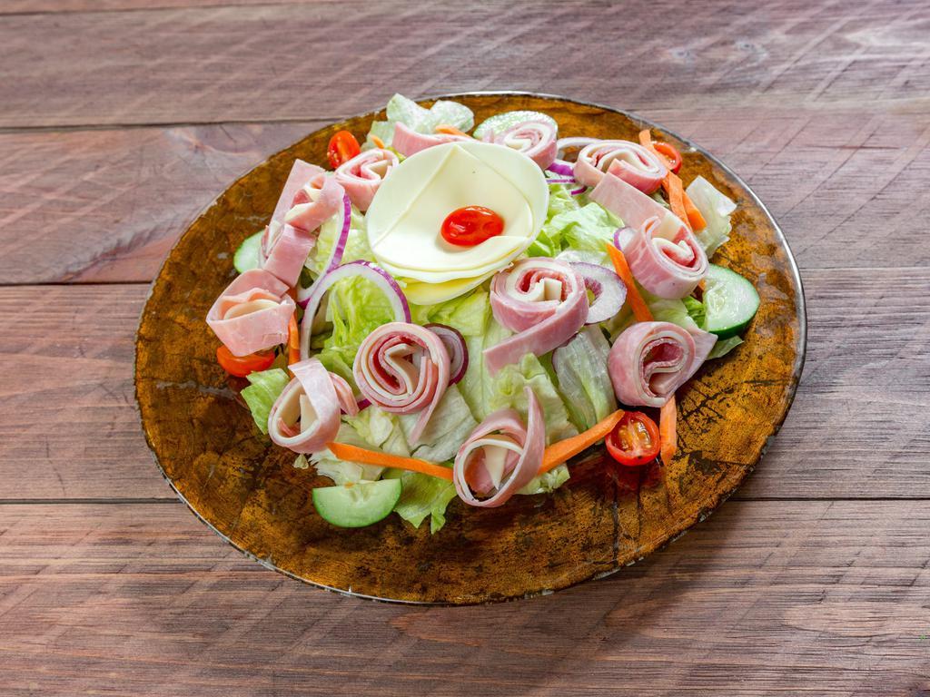 Chef's Salad · Our house salad topped with Italian cold cuts.