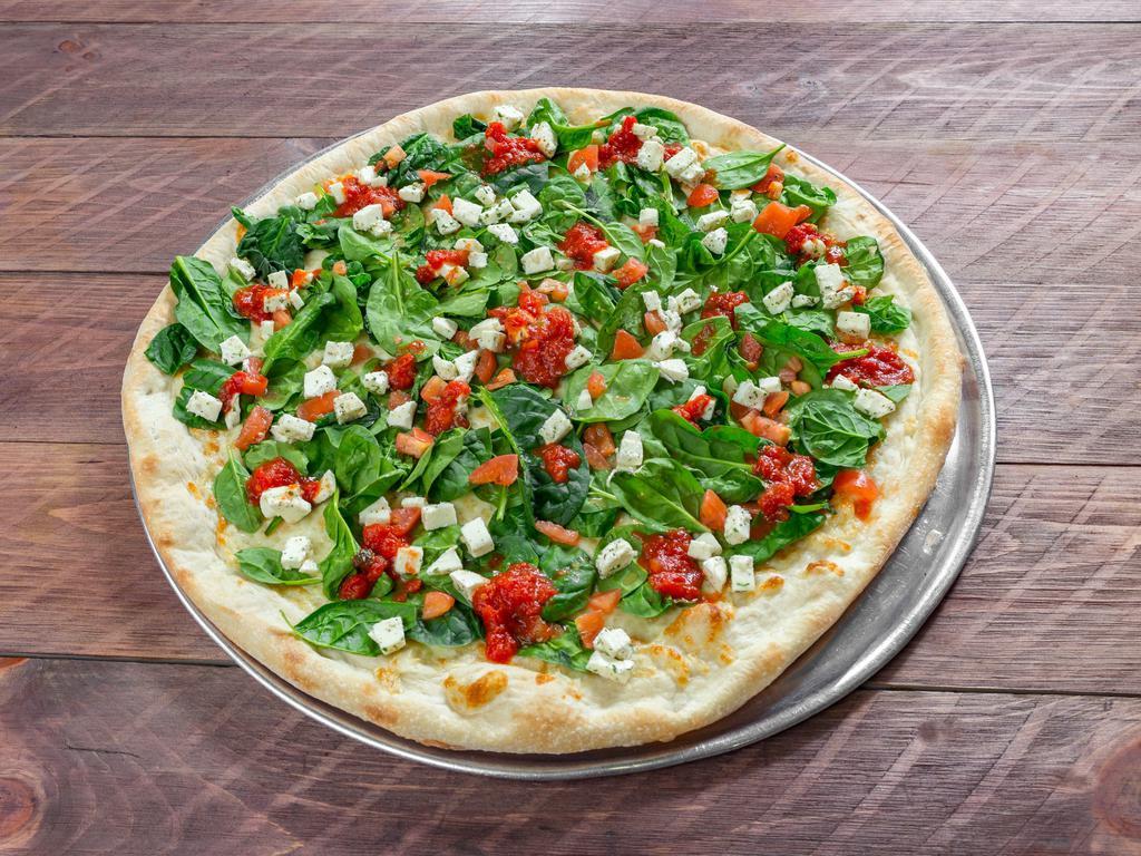 Napoletana Pizza · Mozzarella cheese, spinach, diced tomatoes, diced fresh mozzarella cheese and a touch of our homemade marinara sauce.