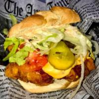 King Chicken Sandwich · Fried chicken breast, tomatoes, pickles, lettuce.