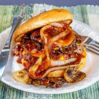 The BBQ Boss Burger · 100% naturally seasoned organic ground beef patty, Swiss cheese, King BBQ sauce, mushrooms, ...
