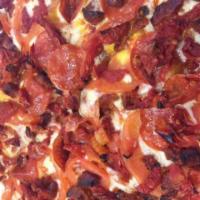 Pappa Caruso Pizza · Pizza sauce, mozzarella cheese, pepperoni, Italian sausage, sliced and sun-dried tomatoes. 