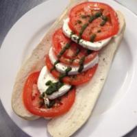 Capressa Submarine · Buffalo mozzarella cheese, sliced tomatoes and basil. 