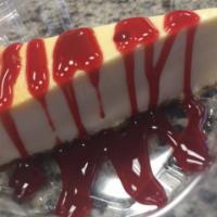 Slice of Cheesecake · Rich creamy cake.