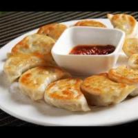 7. Dumplings · 8 pieces, steamed or fried