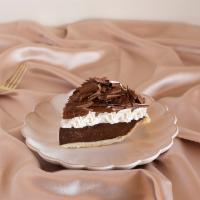 Chocolate  Cream Pie · Decadent chocolate pastry cream decorated with whipped cream and hand-shaved Guittard chocol...