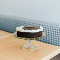 Chocolate Fudge Cake · A traditional moist chocolate cake topped with decadent butter cream frosting and a rich cho...