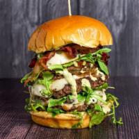 BM Truffle Deluxe · Truffle Infused Double Stack (14oz) 3 Beef Blend Patty, Truffle Carpaccio, Arugula, Grilled ...
