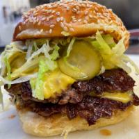 The House Double Burger  · House ground beef, American cheese, dill pickles, special sauce, lettuce, onion, house baked...