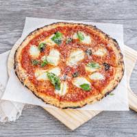Margherita Pizza · Mozzarella di bufala, san marzano tomato, basil, Parmesan.