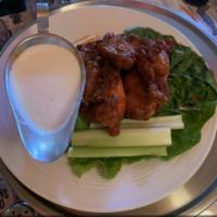 1 lb. Hot Wings · Cooked wing of a chicken coated in sauce or seasoning.