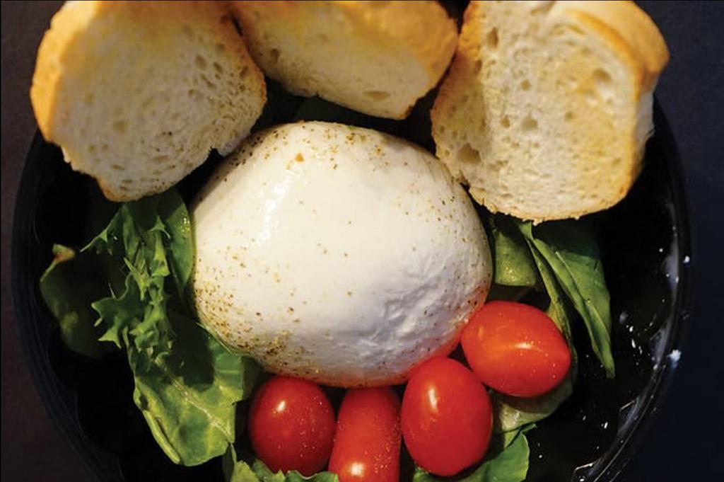 Burrata · Burrata cheese with sliced tomatoes, olives, oil, basil, and toasted fresh bread.