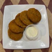 Fried Green Tomatoes · Fried crispy and served with Sweet and Spicy Sauce