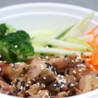 Warm Teriyaki Chicken Bowl · Rice, teriyaki chicken, lettuce, carrot, cucumber, broccoli, teriyaki sauce, sesame seeds.