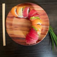 Rainbow Roll · Crab stick, avocado, cucumber salmon & tuna.