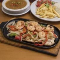 Pollo con Camarones · Grilled chicken breast, sauteed shrimp with pepper and onion, rice, beans, salad, and french...