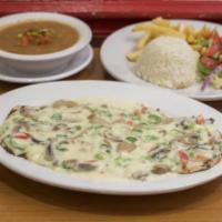 Pollo con Champinones · Chicken breast with mushroom sauce, rice, beans, salad, and french fries.