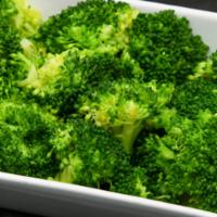 Broccoli - Steamed Or Sautéed · Broccoli florets steamed or sautéed with clarified butter, garlic, salt and black pepper