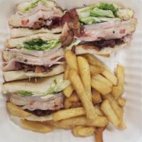 Turkey Club Sandwich (With Fries) · Lettuce, Tomato, Mayo, Bacon, Turkey
