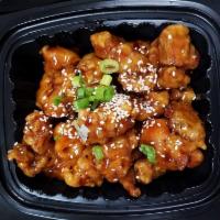 Sesame Chicken · Served with steamed rice. Hot and spicy. 