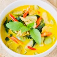 Green Curry · Spicy green curry with tomato, bamboo and basil leaves in coconut milk. Served with steamed ...