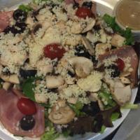 Chef Salad · Romaine lettuce and mixed greens, ham, tomatoes, onions, olives, fresh mushrooms, bell peppe...