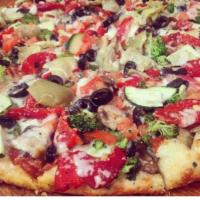 Veggie Lovers Combo Pizza · White sauce, spinach, fresh mushrooms, green onions, tomatoes, zucchini, black olives, roast...
