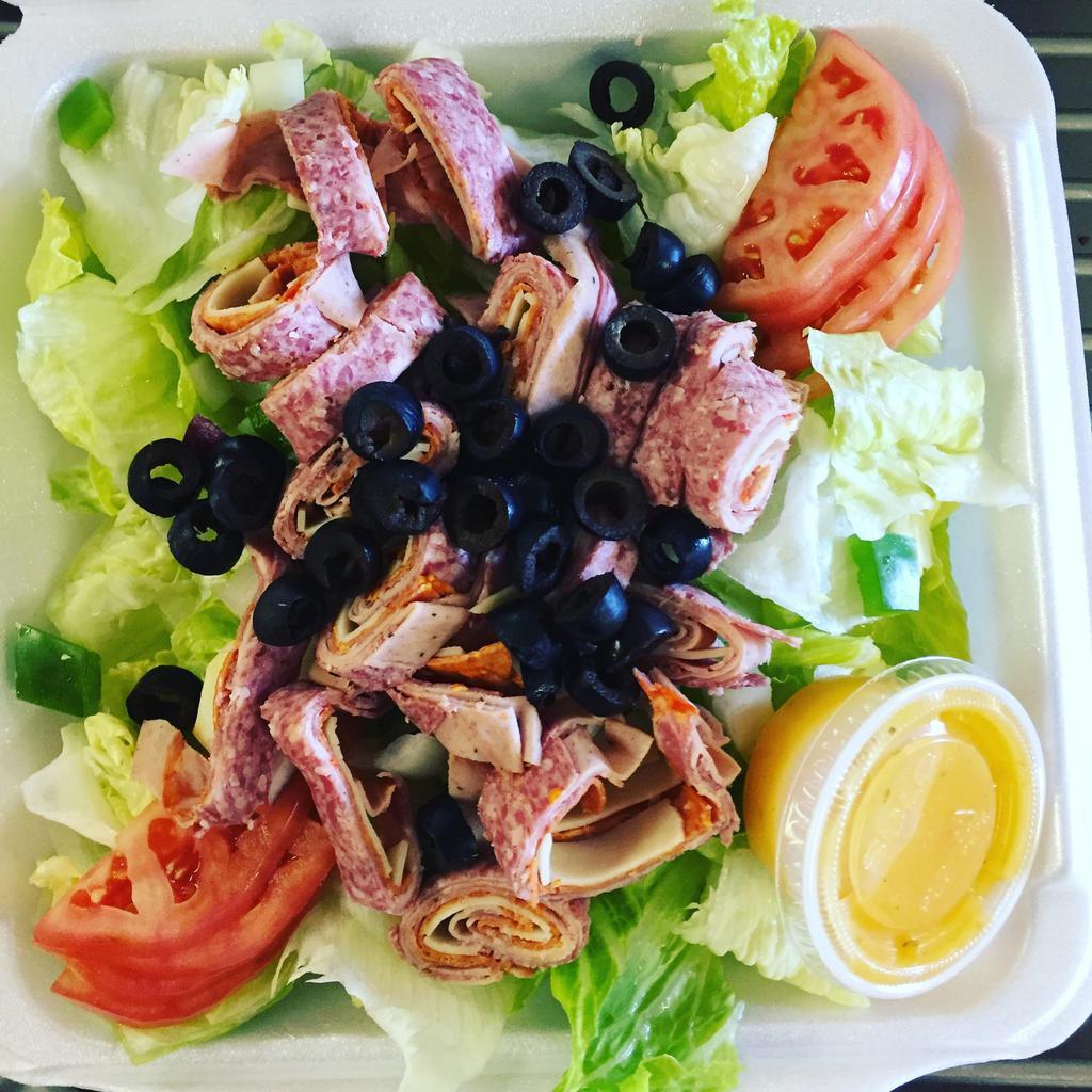 Antipasto Salad · Served with salami, hot capicola, mortadella, pepperoni, provolone cheese, tomatoes, onions, green peppers and olives.