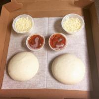 Make Your Own Pizza Kit · Two 6oz Pizzas Doughs, 2 Sides of Cheese & 2 Sides of Pizza Sauce.