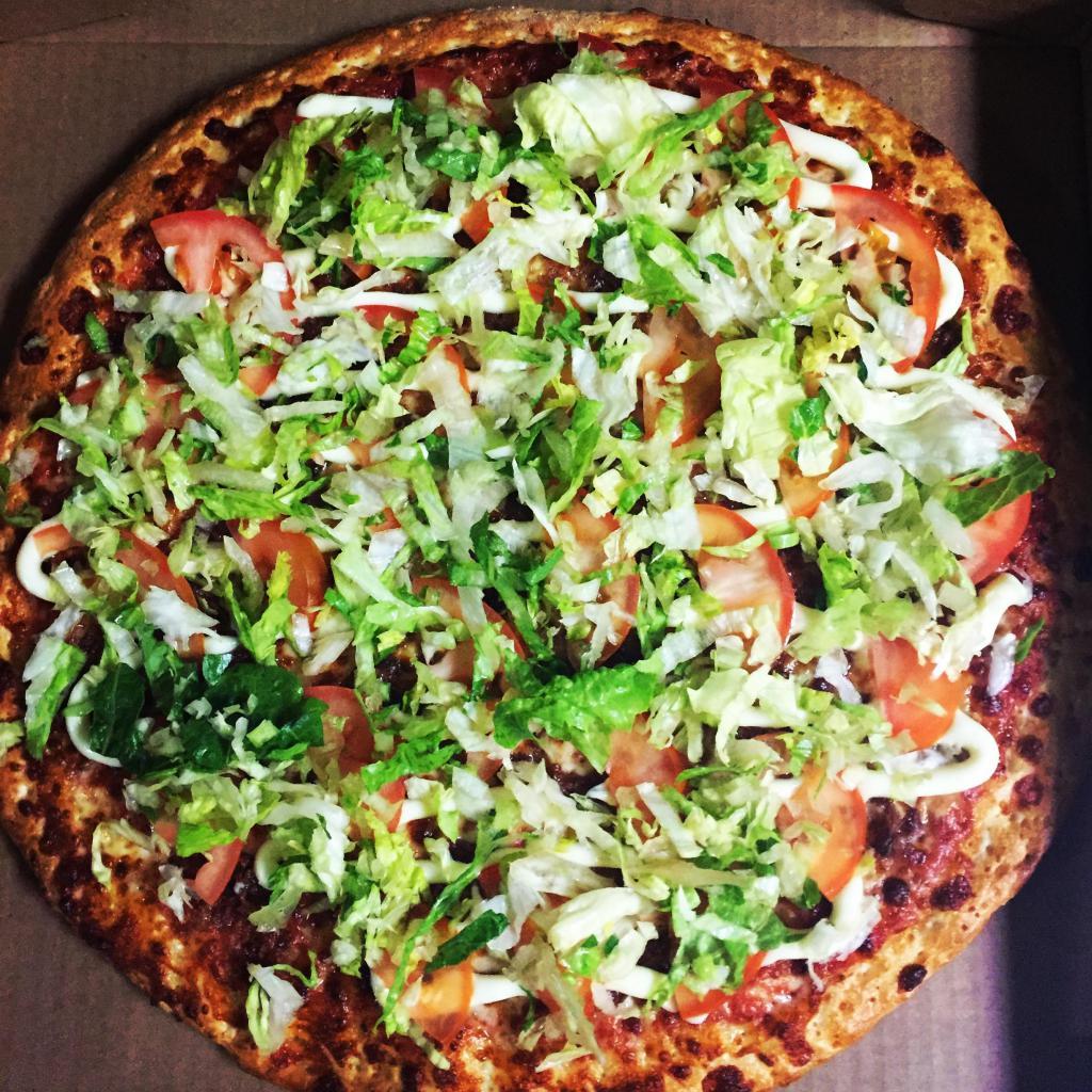 BLT Pizza · Crispy Bacon and Cheese Pizza Topped with Lettuce, Tomato and Mayo