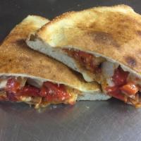 Federal Hill Calzone · Ronzio's own marinara sauce, cheese, grilled seasoned Italian sausage, fire roasted red pepp...